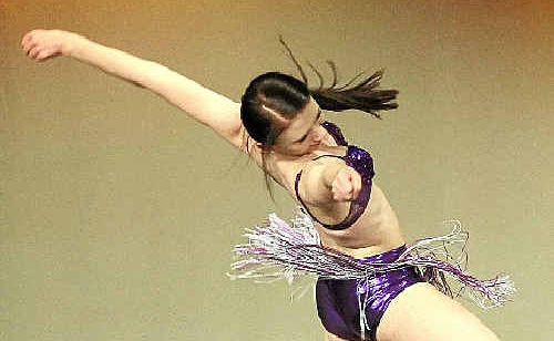 Lauren Stone executes a back-bending leap.